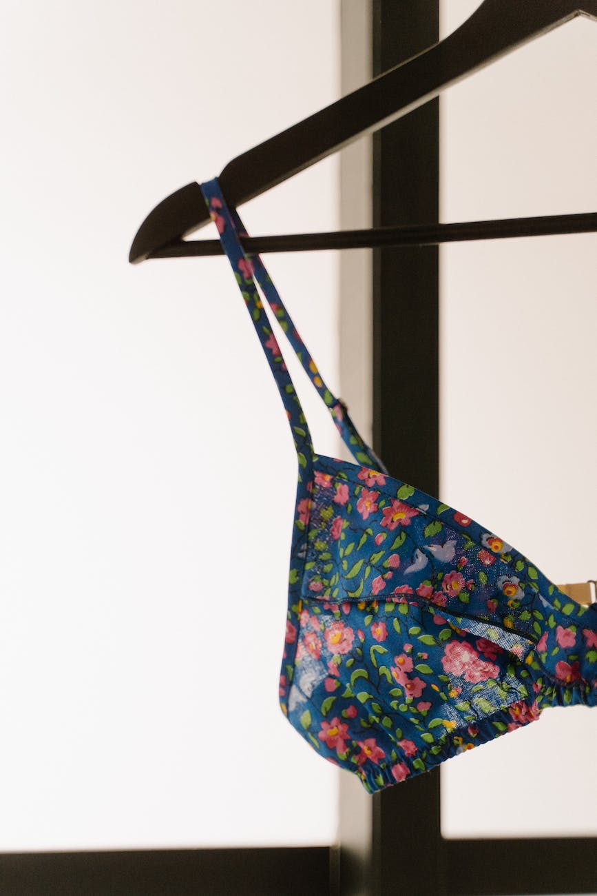 close up shot of a floral bra on the hanger